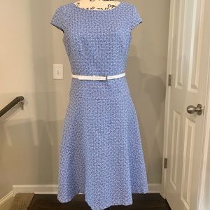 A line, belted knee length dress